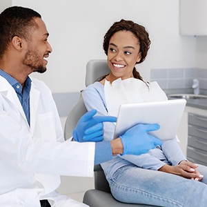 Woman smiling at the dentist