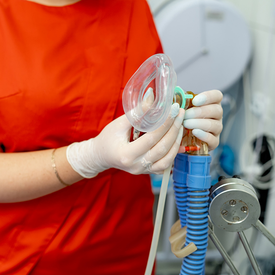 Holding nasal mask used for nitrous oxide sedation